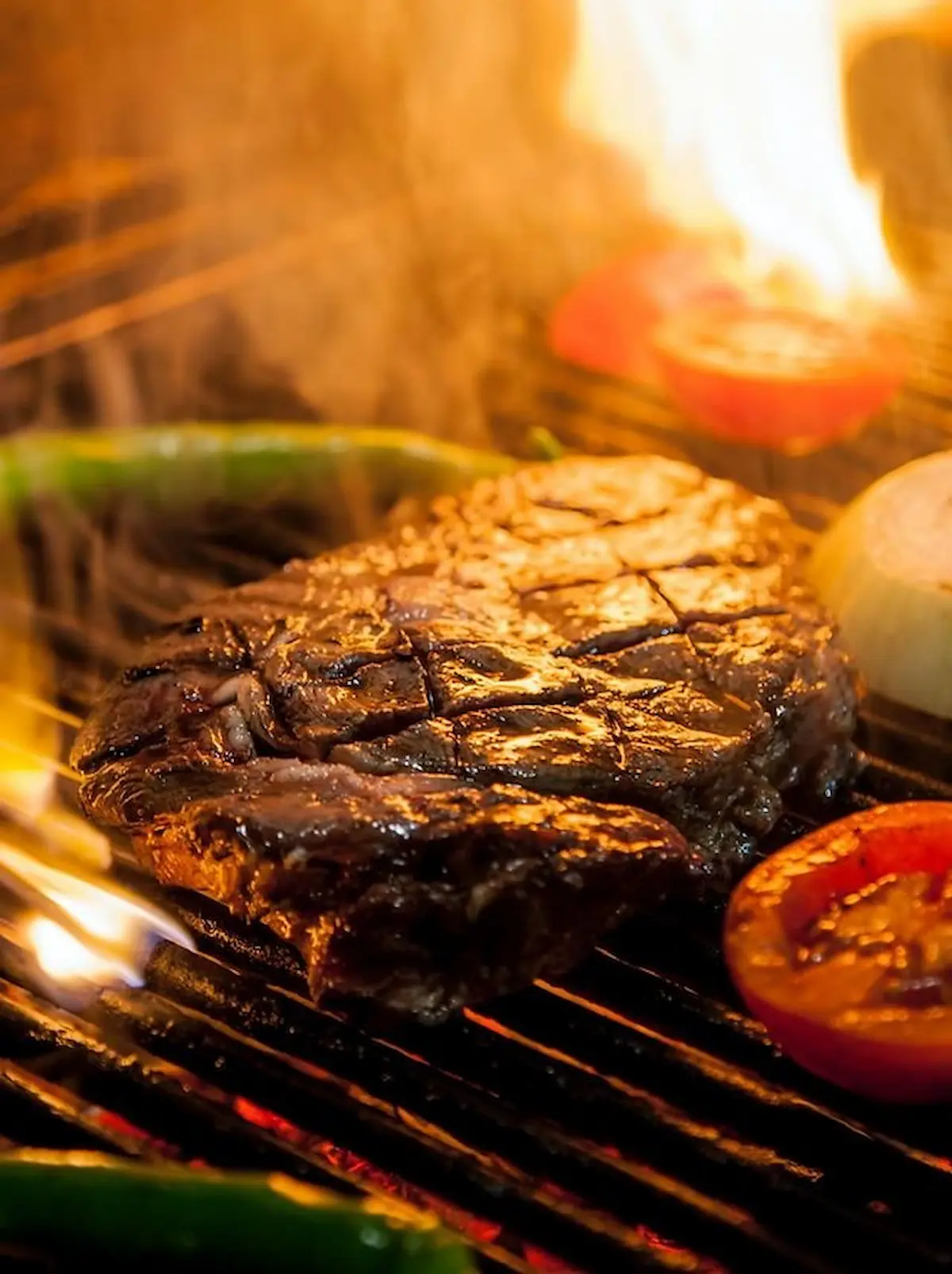 Gegrilde steak op barbecue met groenten bij Telepizza Amstelveen
